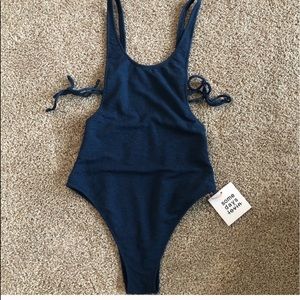 Navy blue swim suit. No tags